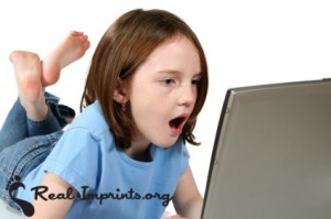 Girl Shocked Looking at the Computer