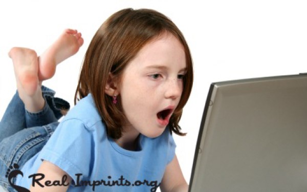 Girl Shocked Looking at the Computer